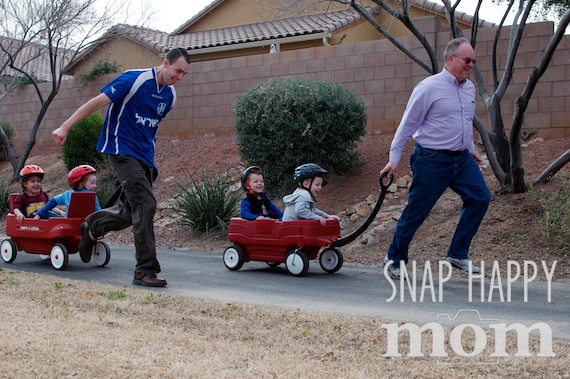 Olympics Birthday Party from SnapHappyMom.com - Bobsledding with Wagons for the Winter Olympics