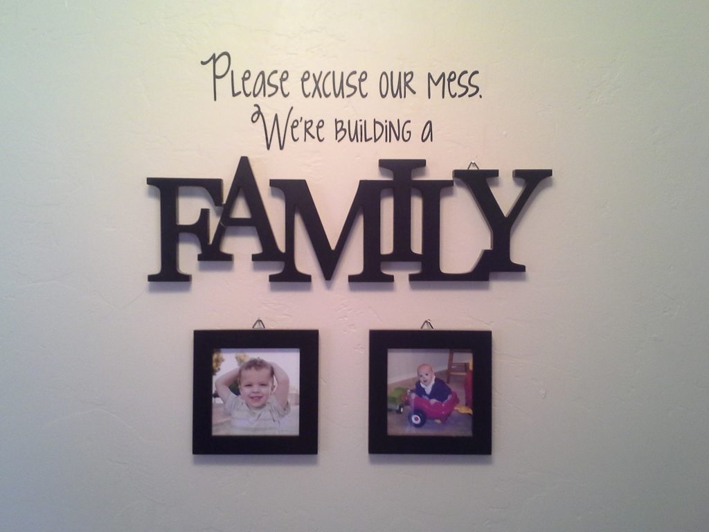 "Please Excuse Our Mess - We're building a family." from SnapHappyMom.com